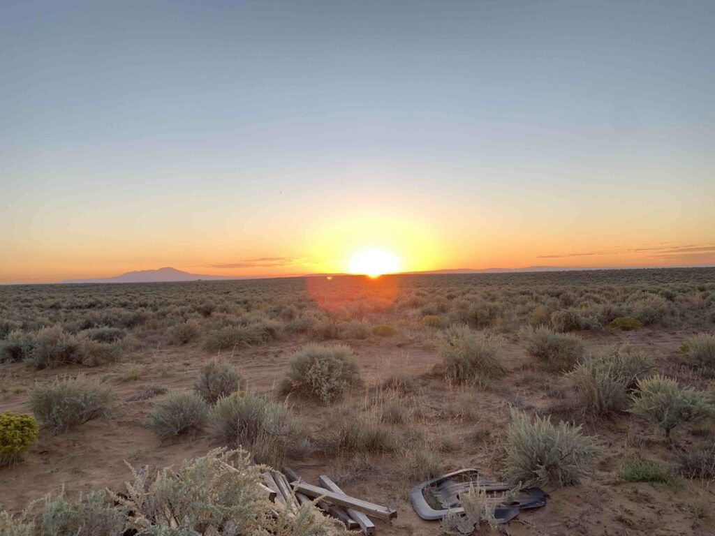 Sunrise over a desert valley.